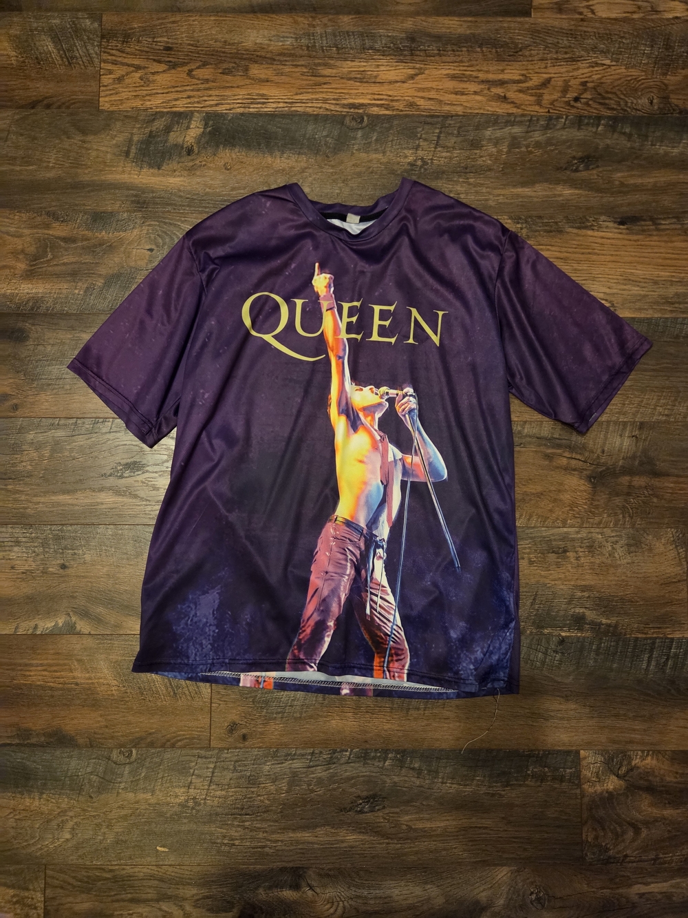 Purple Queen band tee with graphic of Freddie Mercury